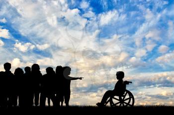 Disabled child in wheelchair and children banish him day. Concept disabled child