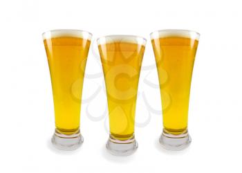 Three glasses of beer. Isolated on white background
