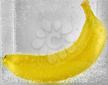 Ripe banana in the water. design element