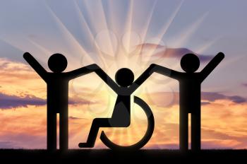 Happy disabled person in a wheelchair together with healthy people. Concept of social assistance