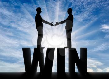 Silhouette two men are going to shake hands, standing on the word win. The concept of winnings and mutual benefits in business