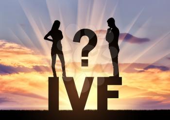 Thoughtful man and woman standing on the word IVF think of in vitro fertilization. The concept of decision-making on in vitro fertilization