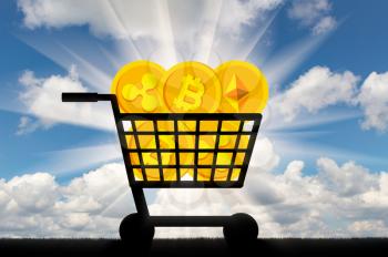 Coins of crypto currency lie in the grocery cart. The concept of buying and selling of crypto currency
