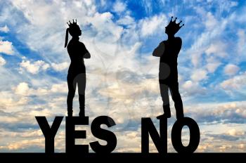 Silhouette of a selfish couple with crowns on their head can not agree, standing on the word yes and no. Conceptual scene of selfishness
