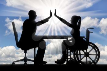 Disabled worker. Silhouette of a woman disabled in wheelchair and a colleague doing the hand gesture high five