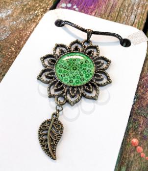 Beautiful green pendant with point painting. Jewelry for women.