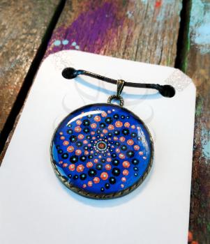 Beautiful blue pendant with point painting. Jewelry for women.
