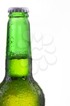 Beer bottle with drops isolated on wgite