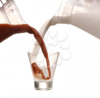 Pouring chocolate and milk mixing. Chocolate cocktail