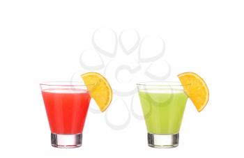 red and green alcohol cocktail with orange slice isolated on white background