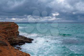 Beautiful view of ocean waves and a fantastic rocky shore, Sea patterns, background wallpaper.