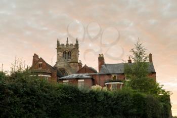 Church tower of parish church in Ellesmere Shropshire in England at sunset