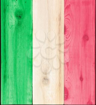 Timber planks of wood that have been painted or stained in the colors of a flag as a background for Italy or Italian items
