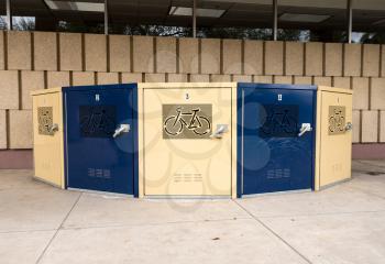 Set of secure box containers for commuters to store bicycles securely