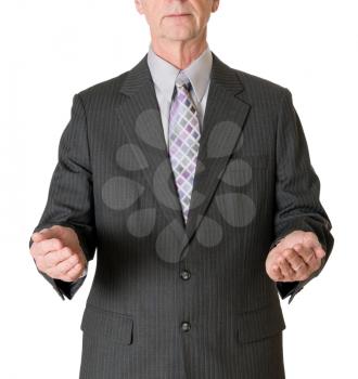 Senior caucasian businessman or executive isolated against white background. Subject is facing camera and has arms out to hold a large object