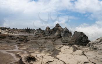 Coastline and rugged lava rocks called Dragons Teeth at Makaluapuna Point near Kapalua, Maui, HI, USA
