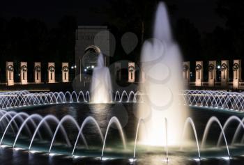 World War 2 memorial and fountains at night in Washington DC