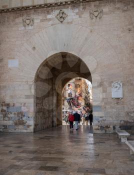 VALENCIA, SPAIN - MARCH 16, 2018: City Gate between two towers in old city of Valencia on coast of Spain