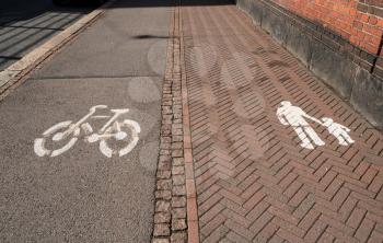 Painted signs for cycling and for pedestrians in Helsinki