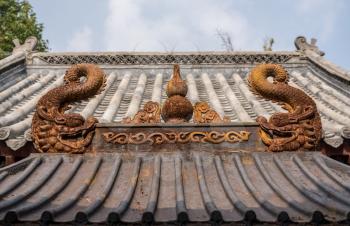 Rusty dragons on roof by Temple of Supreme Purity of Tai Qing Gong at Laoshan