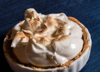 Close macro shot of the crisped top of a home made gluten free lemon meringue pie