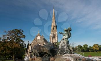 Historic Gefion Fountain opened in 1908 by St Alban's church in Copenhagen in Denmark