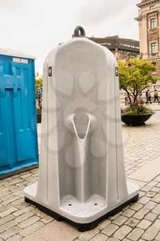 Modern urinal in  Gamla Stan in Stockholm, Sweden. This was in place for the half marathon that day.