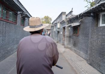 BEIJING, CHINA - 20 OCTOBER 2018: Ride on rickshaw in Hutong district of Beijing