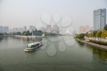 River boat tour by Tientsin Eye Ferris wheel in Tianjin