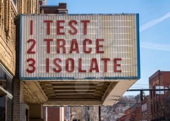 Mockup of movie cinema billboard with Test, Trace, Isolate message to control the coronavirus epidemic once economy opens up
