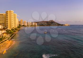 Aerial panorama of Waikiki beach and Diamond Head on Oahu, Hawaii at sunset