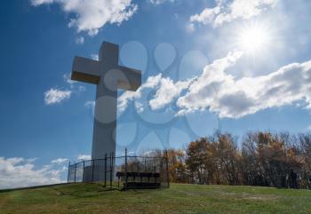 Sun flare around the metal structure of the Great Cross of Christ on Dunbar's Knob in Jumonville, PA