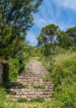 Steps leading to ruins of old Venetian fort above the coastal town of Novigrad in Croatia