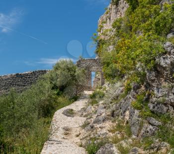 Steps leading to ruins of old Venetian fort above the coastal town of Novigrad in Croatia