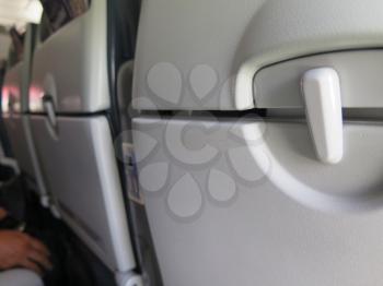 Airplane seat inside an aircraft