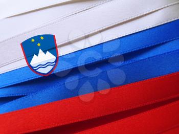 Slovenia flag or banner made with red, blue and white ribbons