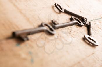 key to success concept - arrow composed of old keys