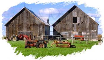 Royalty Free Photo of Two Barns and Tractors