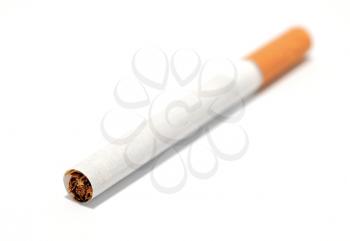 Macro shot of classic cigarette on a white background.