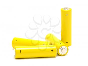 Yellow AA size batteries placed on a white background.