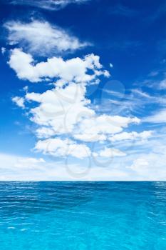Cloudy sky and ocean. Tropical vertical composition
