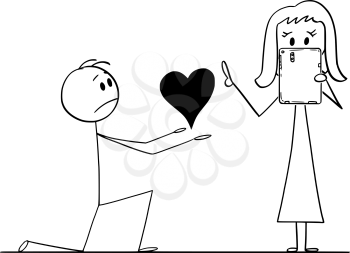 Cartoon stick drawing conceptual illustration of man kneeling and giving big heart to his beloved woman of love, but she is rejecting or ignoring his proposal because she is networking on tablet.