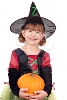 happy little girl witch with pumpkin halloween