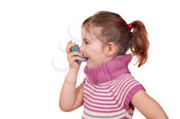 little girl with inhaler on white