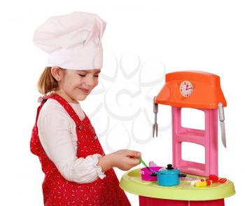 happy little girl play cooking