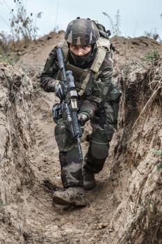 Paratrooper of french 1st Marine Infantry Parachute Regiment RPIMA in entrenchments