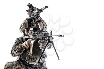 Two Army Rangers in field Uniforms with weapon. Studio shot