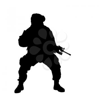 Studio shoot of modern infantry soldier, U.S. marine rifleman in combat uniform, helmet and body armor, screaming and crouching down with assault service rifle in hands silhouette isolated on white background