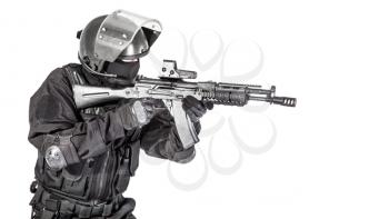 Russian special forces operator in black uniform and bulletproof helmet