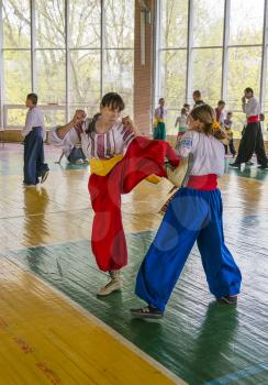 Lviv, Ukraine - April 25.2015: Competitors in the martial arts to perform in the gym in the city park in Lviv, Ukraine